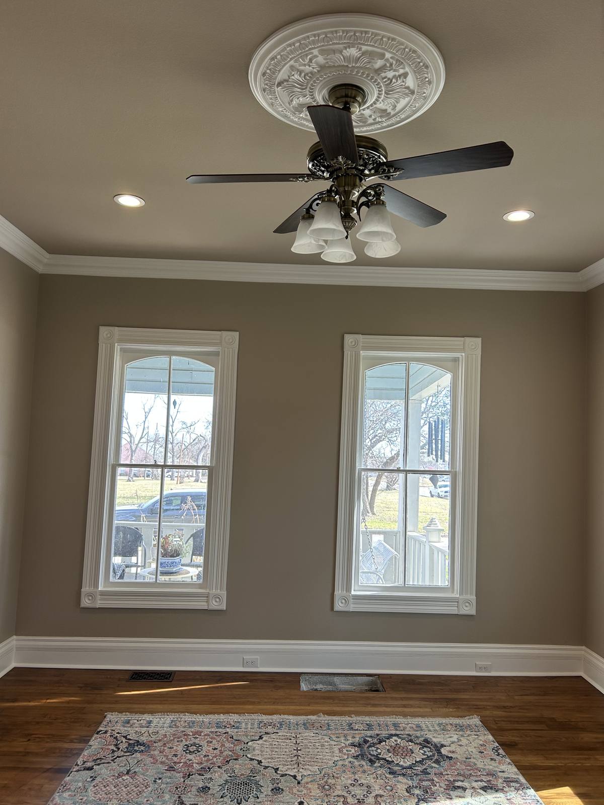 Bright living room with new windows by RCS Remodeling